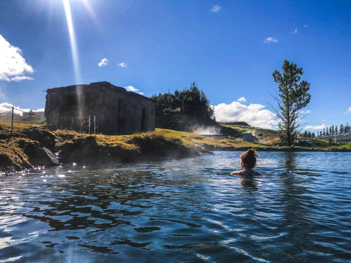 Free hot spring in Iceland on a sunny day