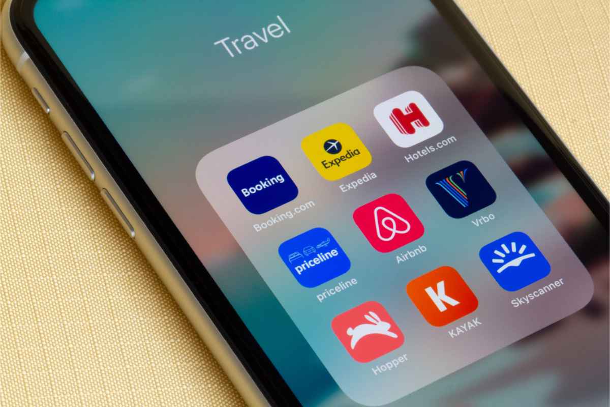Cell phone with several travel apps on screen