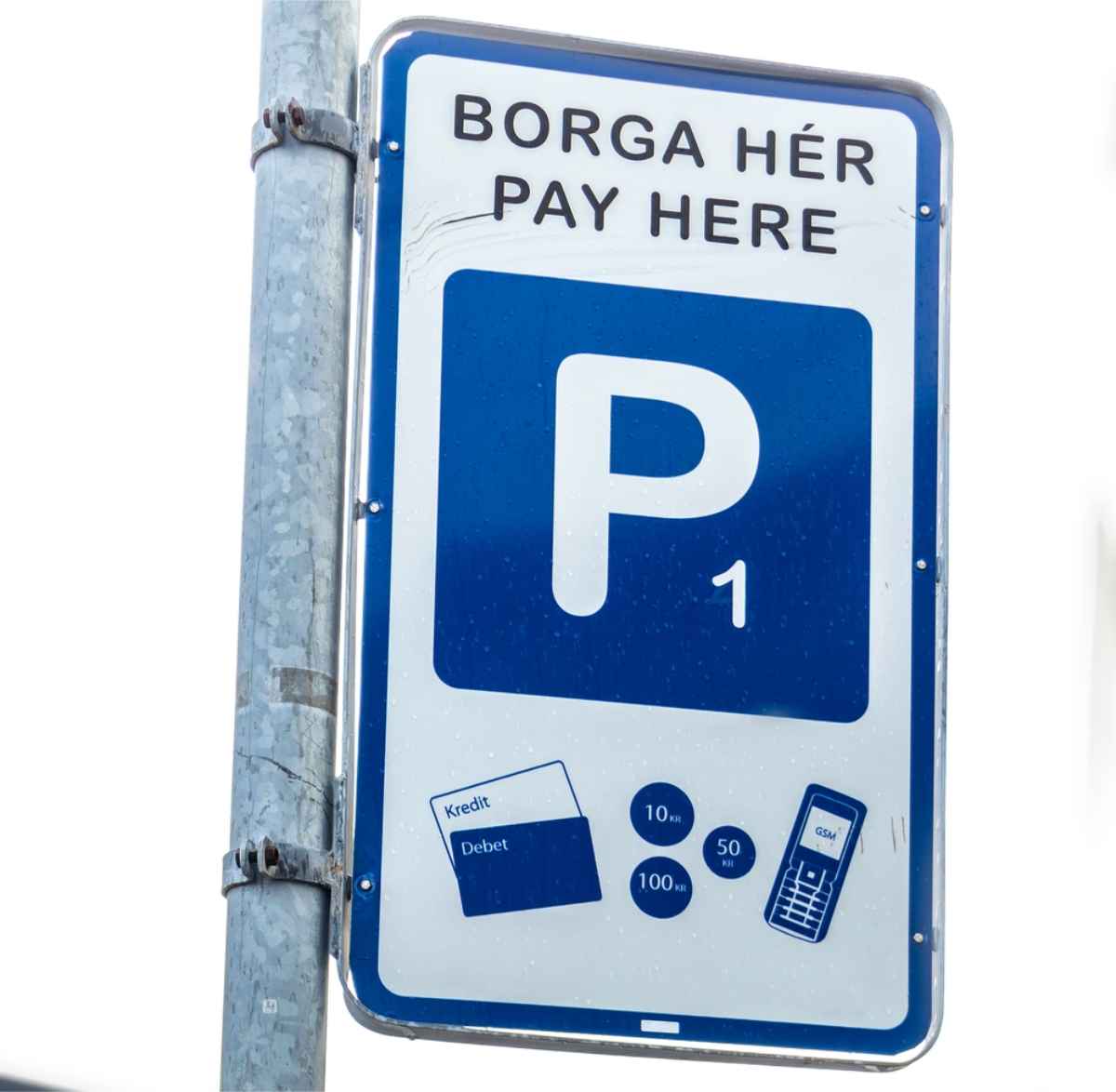 Parking at Keflavik Airport Icelandic sign showing where to pay for your parking