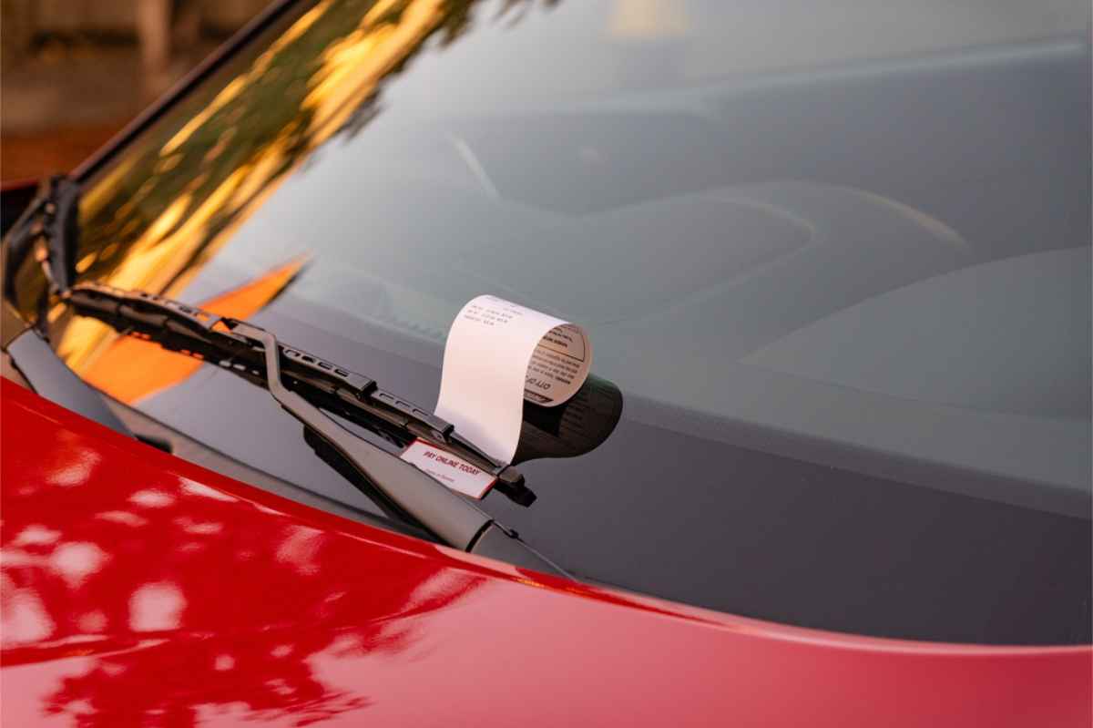 Avoiding parking fines in Iceland Parking fine on car's windshield