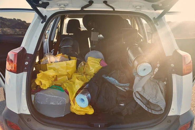 A Small camper trunk full of stuff ready for camping on Iceland's Ring Road