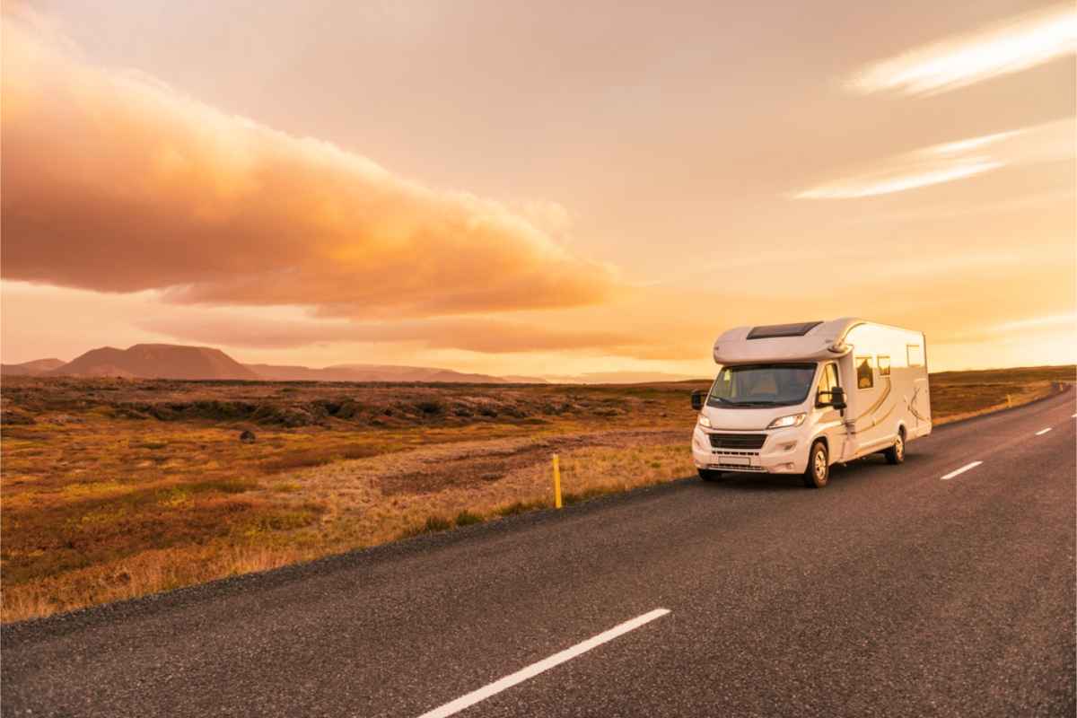 motorhome on the road in Iceland at dusk