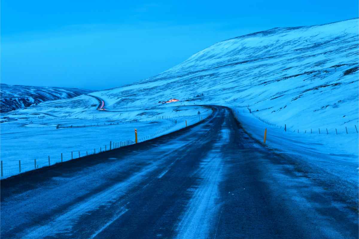 Main road in Iceland during the winter time with low daylight